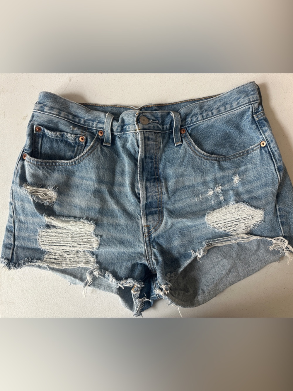 Levi's Light Blue Distressed Denim Shorts